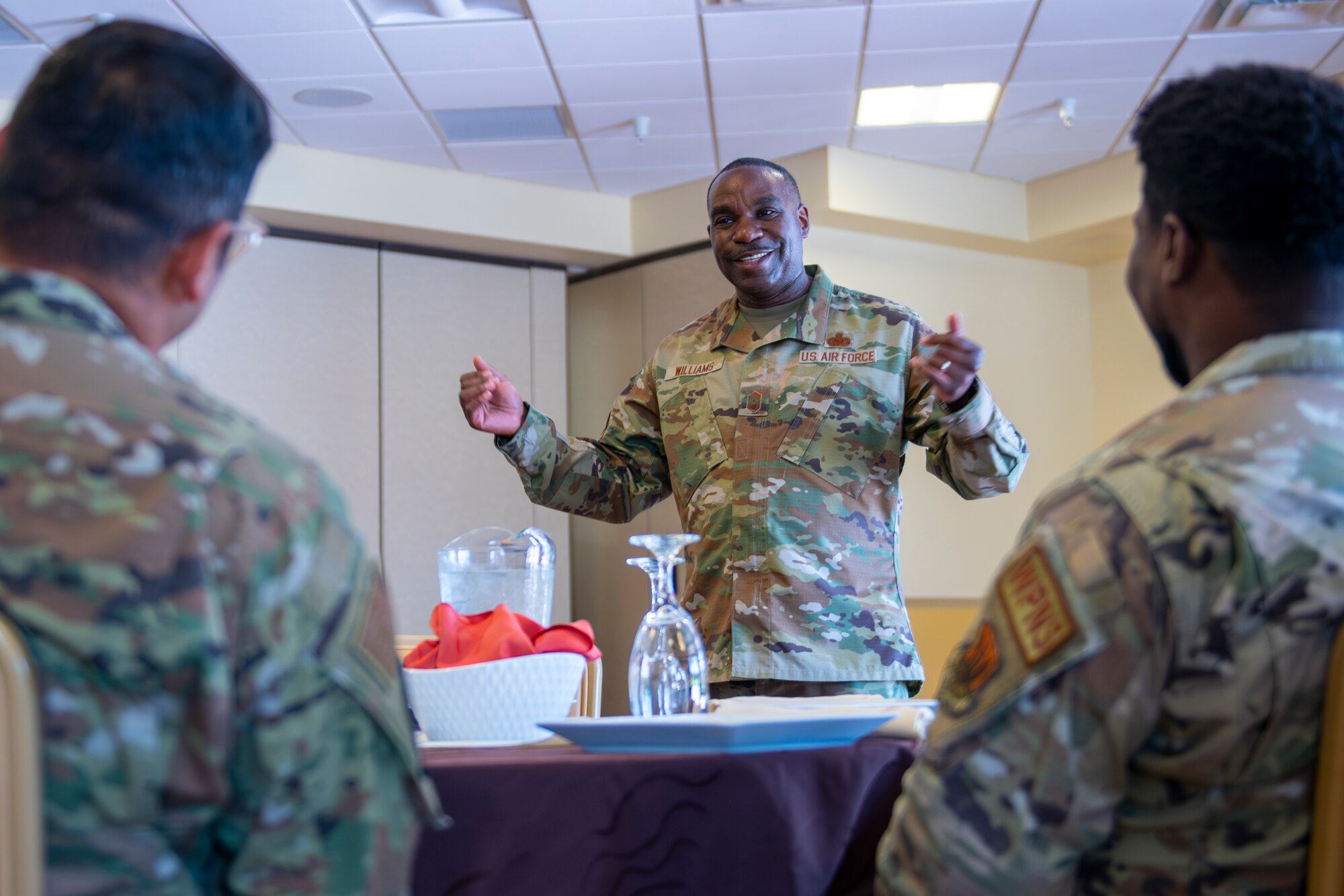 U.S. Air Force Chief Master Sgt. Maurice Williams, command chief, Air National Guard, addresses junior enlisted Airmen of the 125th Operations Group’s Detachment 1 during a luncheon at Homestead Air Reserve Base, Florida, July 11, 2023.