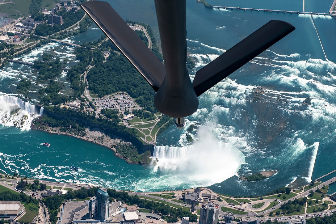 An aerial view of Niagara Falls, N.Y. is shown from beneath an Air Force aircraft.