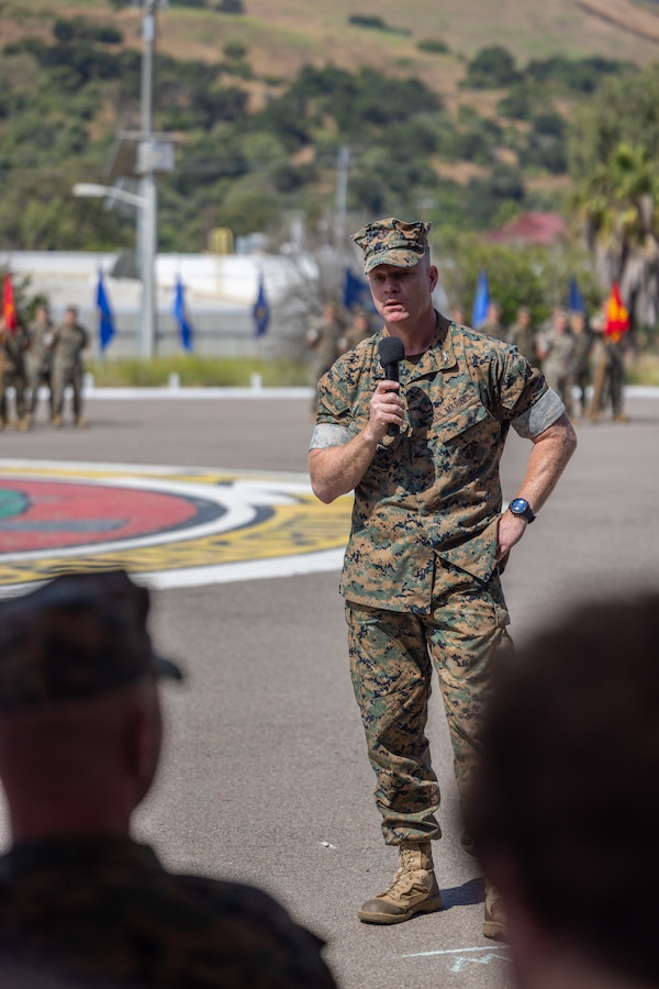 U.S. Marine Corps Col. Seth MacCutcheon, the commanding officer of School of Infantry – West, delivers remarks during a change of command ceremony for the Advanced Infantry Training Battalion, SOI-West on Marine Corps Base Camp Pendleton, California, July 7, 2023. During the ceremony,  Lt. Col. Thomas Carey, the outgoing commanding officer, relinquished command to Lt. Col. Lonnie Wilson, the incoming commanding officer. AITB, SOI-West, trains, coaches, and qualifies entry-level Marines and Sailors in reconnaissance and advanced infantry skills to fight and win in current and future operating environments. (U.S. Marine Corps photo by Sgt. Andrew Cortez)