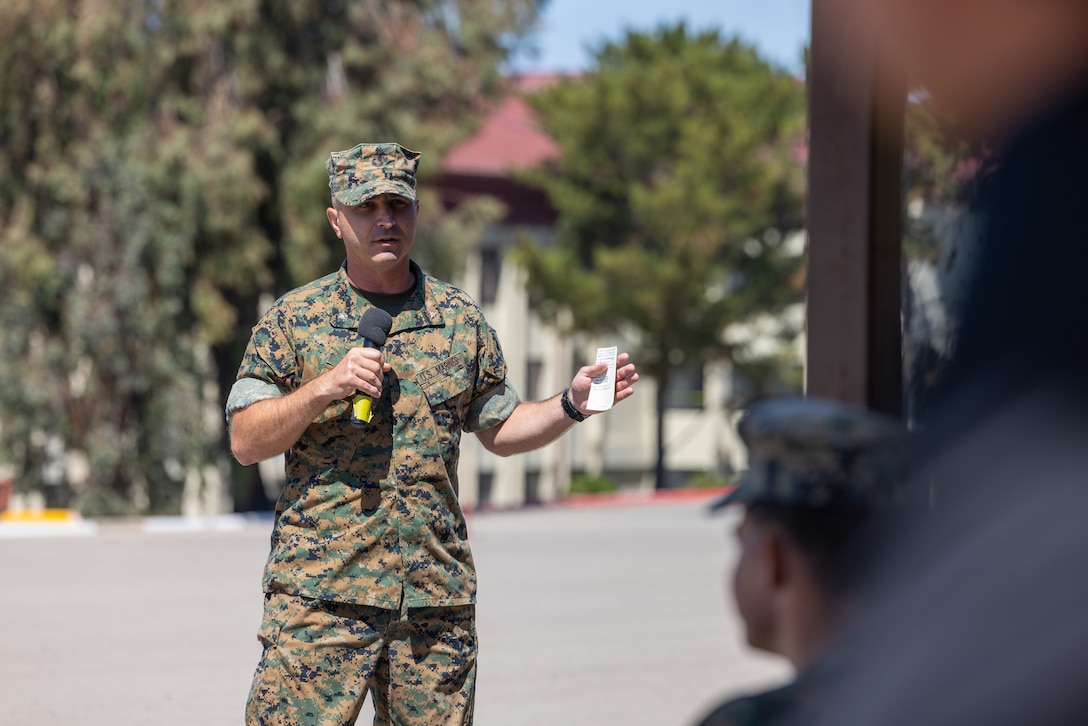 U.S. Marine Corps Lt. Col. Lonnie Wilson, the incoming commanding officer of Advanced Infantry Training Battalion, School of Infantry -West, delivers his remarks during a change of command ceremony on Marine Corps Base Camp Pendleton, California, July 7, 2023. During the ceremony, Lt. Col. Thomas Carey, the outgoing commanding officer, relinquished command to Lt. Col. Lonnie Wilson, the incoming commanding officer. AITB, SOI-West, trains, coaches, and qualifies entry-level Marines and Sailors in reconnaissance and advanced infantry skills to fight and win in current and future operating environments.  (U.S. Marine Corps photo by Sgt. Andrew Cortez)