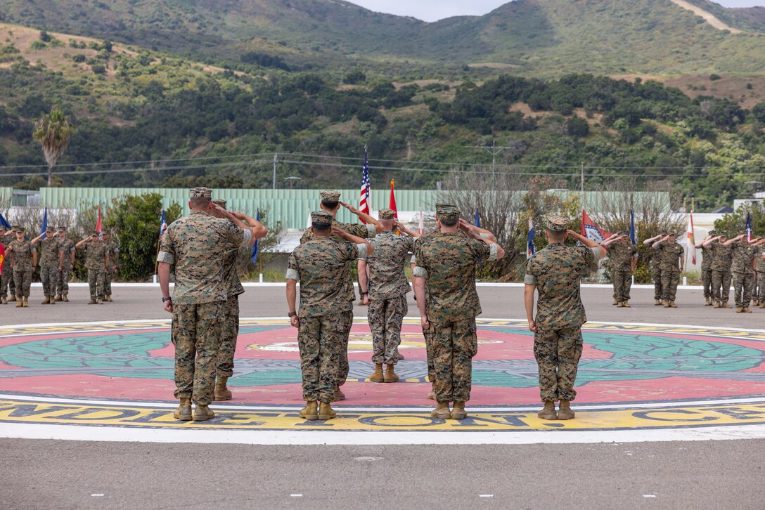 U.S. Marines with Advanced Infantry Training Battalion, School of Infantry - West, salute the American Flag during a change of command ceremony for AITB, SOI – West, on Marine Corps Base Camp Pendleton, California, July 7, 2023. During the ceremony, Lt. Col. Thomas Carey, the outgoing commanding officer, relinquished command to Lt. Col. Lonnie Wilson, the incoming commanding officer. AITB, SOI-West, trains, coaches, and qualifies entry-level Marines and Sailors in reconnaissance and advanced infantry skills to fight and win in current and future operating environments.  (U.S. Marine Corps photo by Sgt. Andrew Cortez)