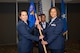 Wing commander hands guidon to new group commander