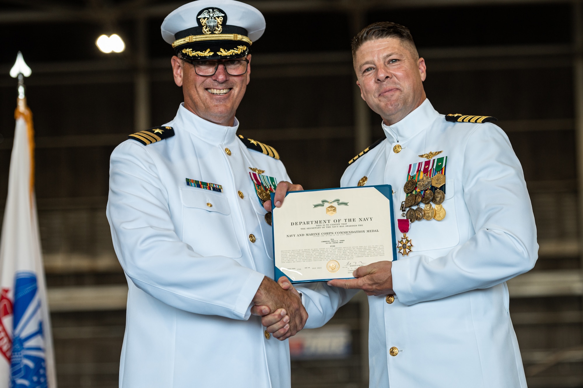 U.S. Navy Capt. Frank T. Ingargiola bids farewell to Sailors assigned to Naval Support Activity Lakehurst at Joint Base McGuire-Dix-Lakehurst, N.J., July 13, 2023. Rear Adm. Wesley R. McCall relieved Ingargiola of his orders, allowing Capt. James B. Howell to assume command. (U.S. Air Force photo by Senior Airman Sergio Avalos)
