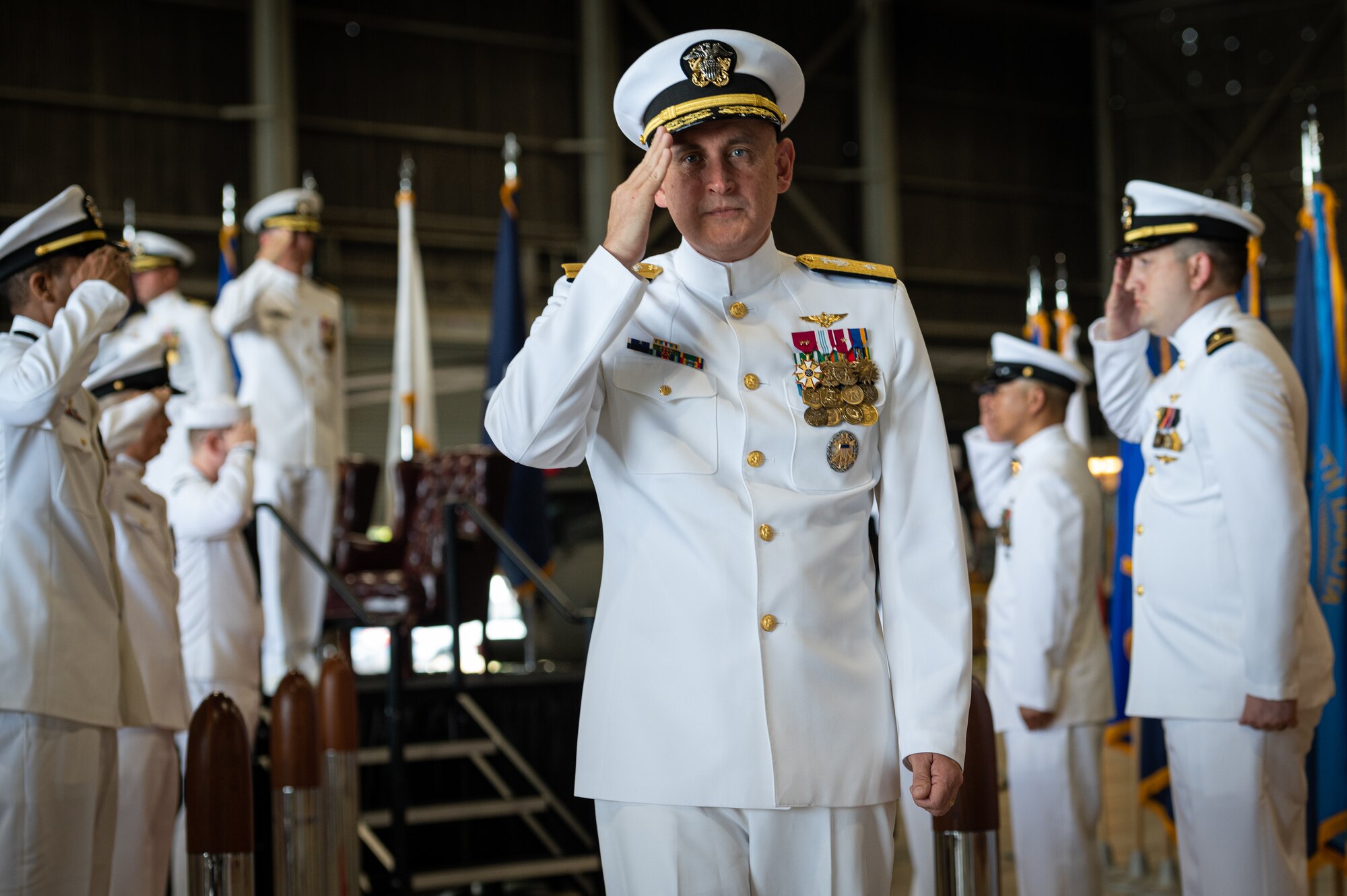 U.S. Navy Capt. Frank T. Ingargiola bids farewell to Sailors assigned to Naval Support Activity Lakehurst at Joint Base McGuire-Dix-Lakehurst, N.J., July 13, 2023. Rear Adm. Wesley R. McCall relieved Ingargiola of his orders, allowing Capt. James B. Howell to assume command. (U.S. Air Force photo by Senior Airman Sergio Avalos)