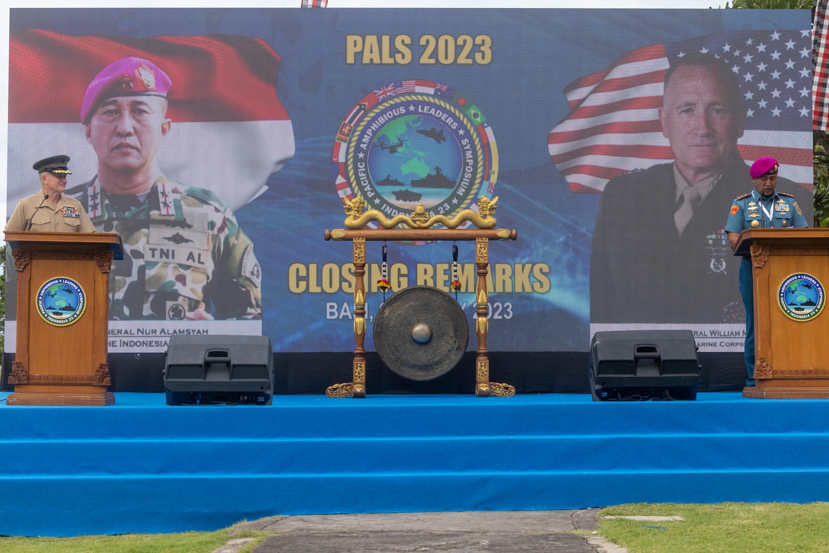 U.S. Marine Corps Lt. Gen. William M. Jurney, left, commander, U.S. Marine Corps Forces, Pacific, and Indonesian Marine Corps Maj. Gen. Nur Alamsyah, commandant, Korps Marinir Republik Indonesia, deliver remarks during the closing ceremony of the Pacific Amphibious Leaders Symposium, Bali, Indonesia, July 13, 2023. PALS strengthens our interoperability and working relationships across a wide range of military operations – from humanitarian assistance and disaster relief to complex expeditionary operations. This year's symposium hosted senior leaders from 24 participating nations who are committed to a free and open Indo-Pacific, with the objective of strengthening and developing regional relationships.