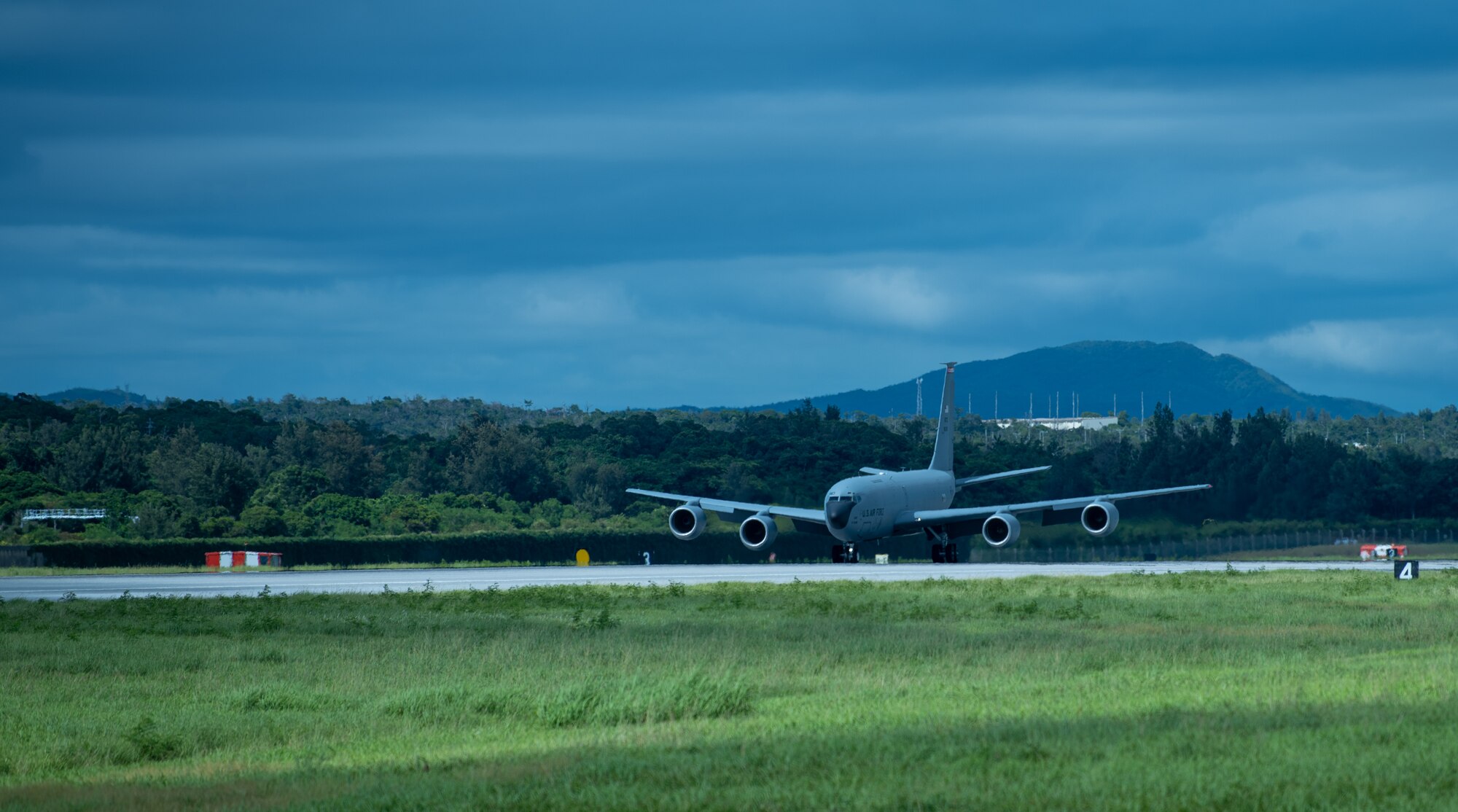 A KC-135 Stratotanker assigned to the 92nd Air Refueling Squadron[Location] lands for a hot-pit refueling.