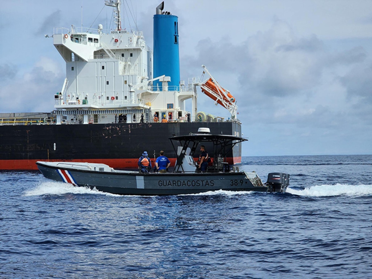 U.S. Air Force pararescuemen with the 131st Rescue Squadron, 129th Rescue Wing, California Air National Guard transfer a patient by hoist down to a Costa Rican Coast Guard vessel, July 11, 2023.