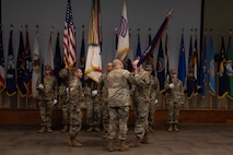 Group of soldiers participate in changing of commandant.