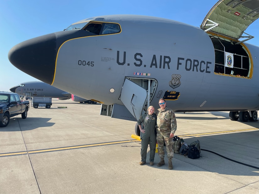 1st Lt. Megan Hirlehey, left, a pilot with the 171st Air Refueling Wing, poses with her father, Master Sgt. Kevin Clancy, a crew chief with the 171st ARW, on July 6 before Clancy marshaled Hirlehey's first flight.  (U.S. Air National Guard Photo)