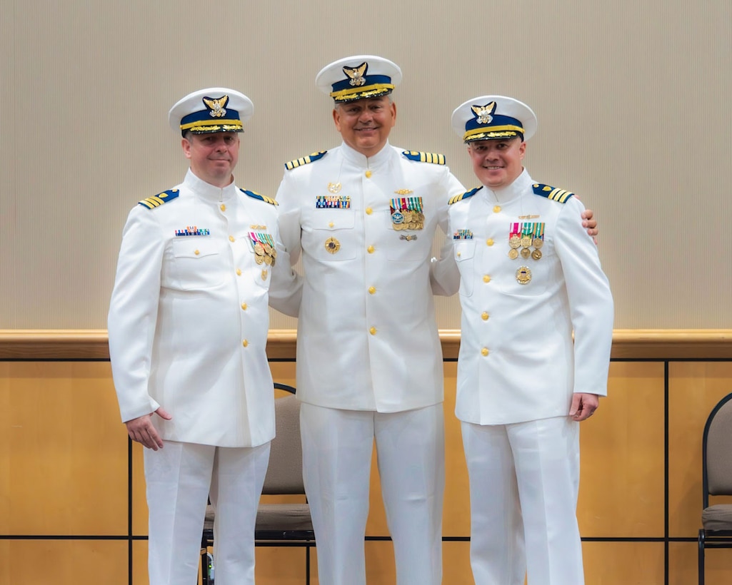 Capt. Francis J. DelRosso, Coast Guard Sector Charleston commander, Cmdr. Kevin Broyles, former Marine Safety Unit Savannah Commander, and Cmdr. Nathaniel Robinson, MSU Savannah commander, poses for a photo during a change-of-command ceremony in, Savannah, Georgia, July 13, 2023. Robinson previously served at Coast Guard Headquarters, where he developed strategy, policy, and concepts for the joint integration with the Department of Defense. (U.S. Coast Guard courtesy photo)