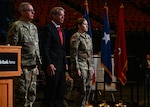 Nebraska Governor Jim Pillen and Maj. Gen. Daryl Bohac, Nebraska adjutant general, present the Nebraska National Guard Heroism Medal to Sgt. Brandi Sullivan during the Nebraska Adjutant General Change of Command Ceremony, July 8, 2023, at the Pinnacle Bank Arena in Lincoln, Nebraska