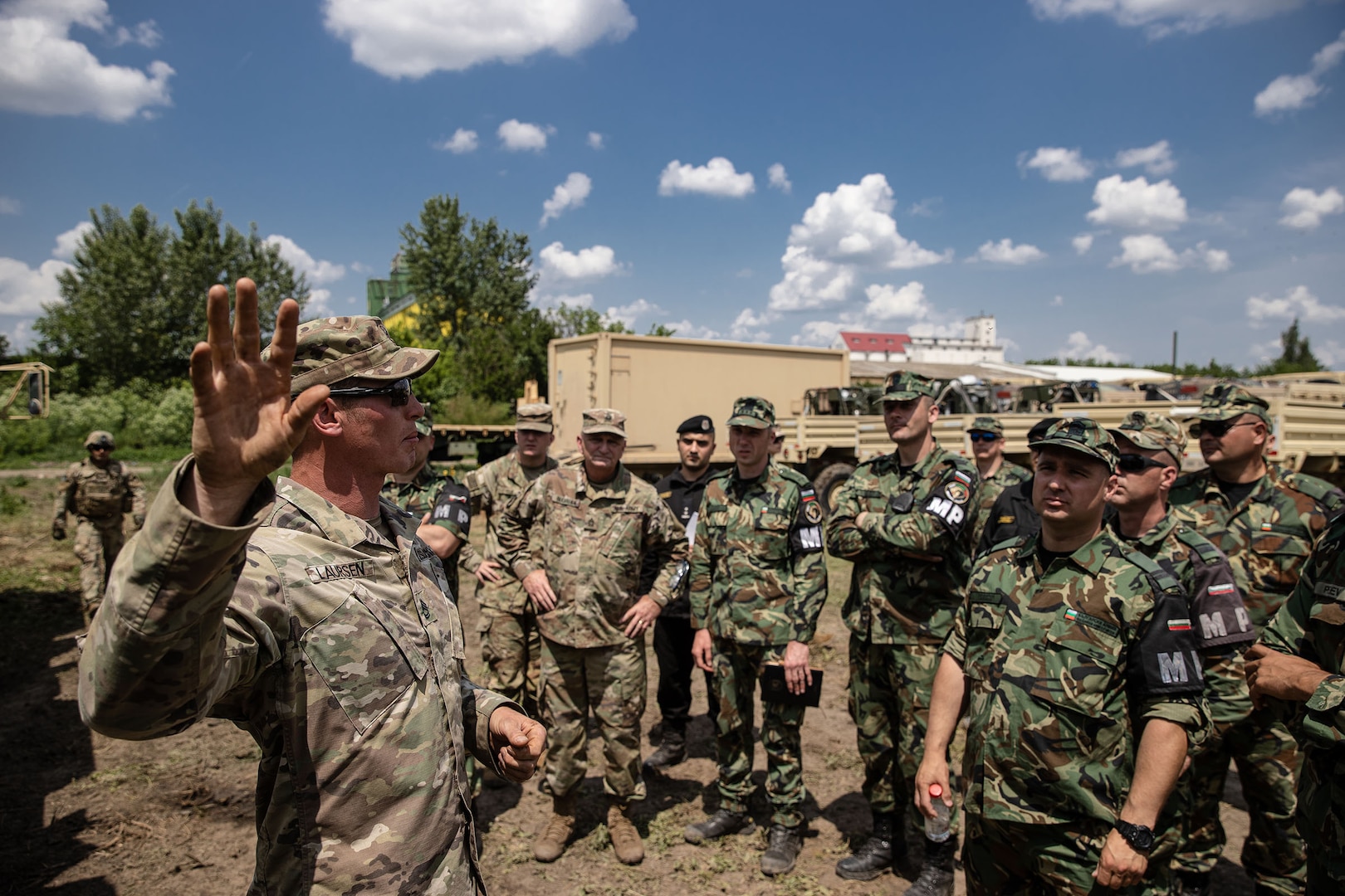 The SFC Jeffery Lauren, 231st MP Battalion instructs NATO partners on vehicle recovery at Saber Guardian in Slobozia, Romania, on May 30, 2023, during Saber Guardian. Saber Guardian 23, a component of DEFENDER 23, is an exercise co-led by Romanian Land Forces and the U.S. Army at various locations in Romania to improve the integration of multinational combat forces by engaging in different events such as vehicle road marches, medical training exercises, and river crossings.