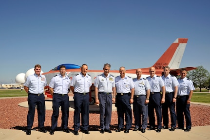 U.S. Air Force Chief Master Sgt. John Criswell, Lt. Col. Brett Seiling, Brig. Gen. Trulan Eyre, Royal Jordanian Air Force Maj. Gen. Malek Habashneh commander of the Royal Jordanian Air Force, U.S. Air Force Maj. Gen H. Michael Edwards The Adjutant General of Colorado, RJAF Lt. Col. Tareq Nasr Ahmad Rawashdeh, U.S Air Force Brig. Gen. Carlton Everhart II, Col. Pete Byrne and Col. Floyd Dunstan pose for a photo at Buckley Air Force Base, Colo., June 21, 2012.