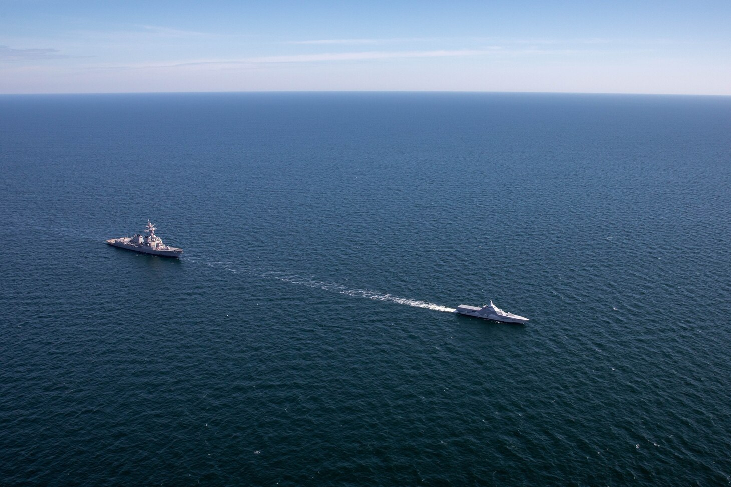 The Arleigh Burke-class guided-missile destroyer USS Roosevelt (DDG 80), left, and the Swedish Navy Visby-class corvette HSwMS Härnösand (K 33) steam in formation during Neptune Strike 23-2, in the Baltic Sea, July 12, 2023. Roosevelt is participating in Neptune Strike 23-2, a multiyear effort focused on the integration of U.S. and NATO allied and partner international force to provide assurance, deterrence, and collective defense for the Alliance and STRIKFORNATO. (U.S. Navy photo by Mass Communication Specialist 2nd Class Elexia Morelos)