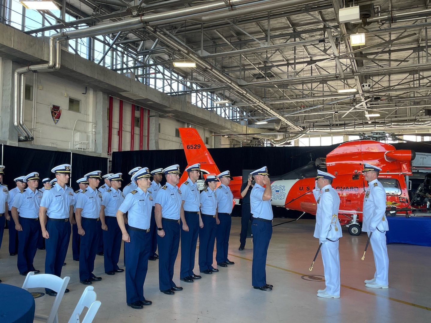 U.S. Coast Guard Capt. Dan Broadhurst relieved Capt. Gregory A. Matyas as the 10th commanding officer of Coast Guard Helicopter Interdiction Tactical Squadron (HITRON) during a change of command ceremony, July 14, at Cecil Airport in Jacksonville. Broadhurst previously served as chief of Incident Management at the Thirteenth Coast Guard District and has also served two previous tours at HITRON, most recently as the executive officer, from 2019-2021 (U.S. Coast Guard photo by Lt. Jessica Wright)