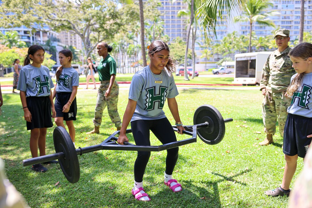 Youth Impact program participants participate in ACFT lanes during Army Day, Fort DeRussy Military Reservation, Hawaii, July 14, 2023. The Hawaii Youth Impact Program brings together service members, University of Hawaii faculty and local volunteers to cultivate leadership, discipline and mentorship skills among aspiring youth.