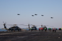 F/A-18s attached to Carrier Air Wing (CVW) 8 and Italian F-35s fly in formation by the world's largest aircraft carrier USS Gerald R. Ford (CVN 78), July 10, 2023. Gerald R. Ford is participating in Neptune Strike, a multiyear effort focused on harmonizing U.S. and NATO planning teams to transfer command and control of Allied naval and amphibious forces to STRIKFORNATO, in order to provide assurance, deterrence, and collective defense for the Alliance. (U.S. Navy photo by Mass Communication Specialist 2nd Class Jennifer Newsome)