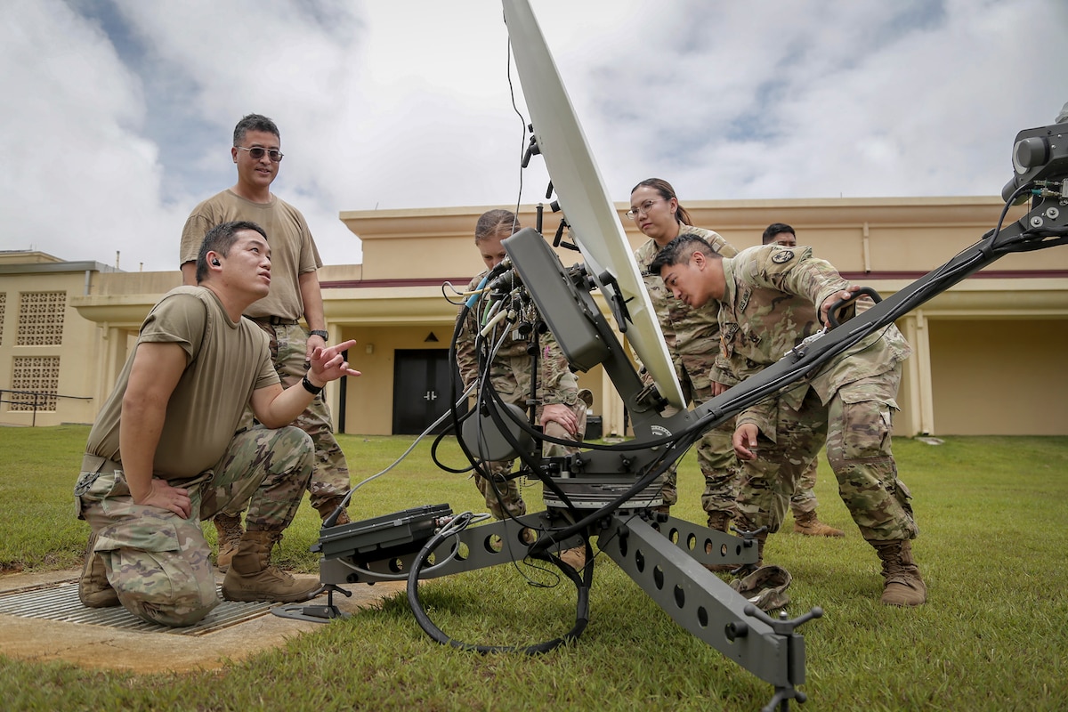Airmen of the 154th Combat Comm. Squadron, Hawaii Air National Guard, assist members of the Guam National Guard with emergency communications equipment following Typhoon Mawar in Barrigada May 28, 2023.