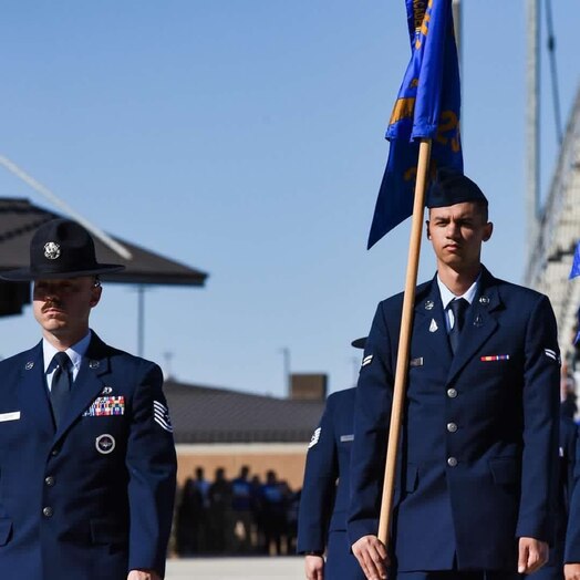 U.S. Space Force Spc. 3 Kevin Capone carries a guidon during Basic Training. Capone was one of the first Guardians to enlist directly into the Space Force.