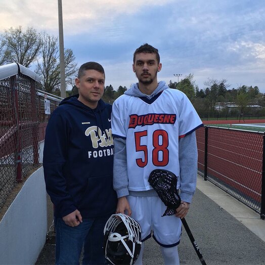  U.S. Space Force Spc. 3 Kevin Capone, right, poses with his father after a lacrosse match. Capone played lacrosse in college while studying at Duquesne University in Philadelphia, Pennsylvania.