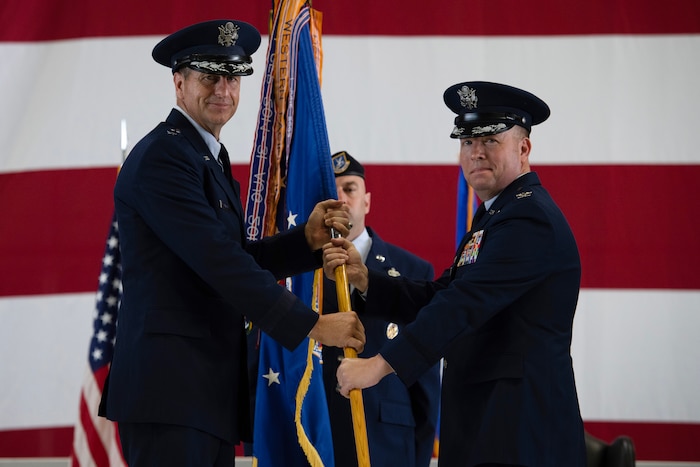 U.S. Air Force members pass guidon