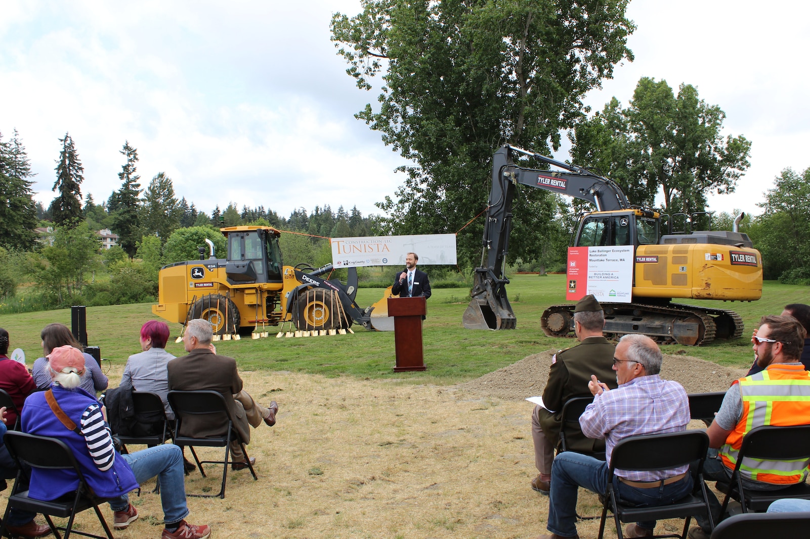 Photos of a group of people at a groundbreaking ceremony.