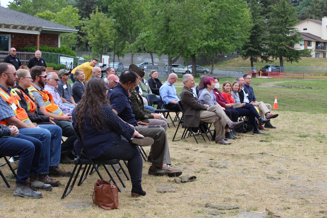 Photos of a group of people at a groundbreaking ceremony.