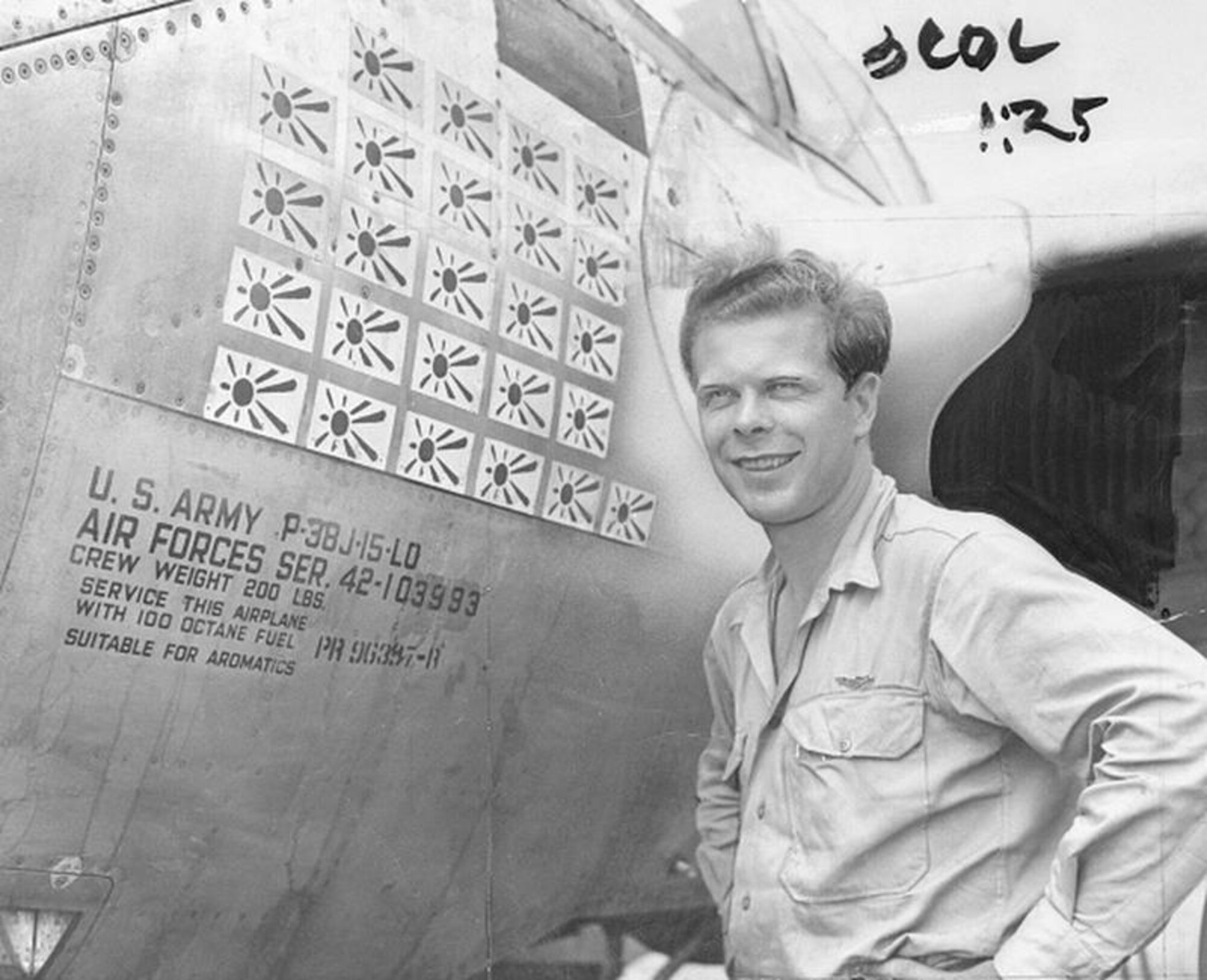 U.S. Army Air Forces Maj. Richard Bong stands next to his Lockheed P-38 Lighting fighter plane during World War II, circa 1945. Bong, who is remembered as one of the most celebrated Fightin' 49ers in history, is the American Ace of Aces with 40 confirmed aerial kills during World War II. (Photo courtesy of History Daily)