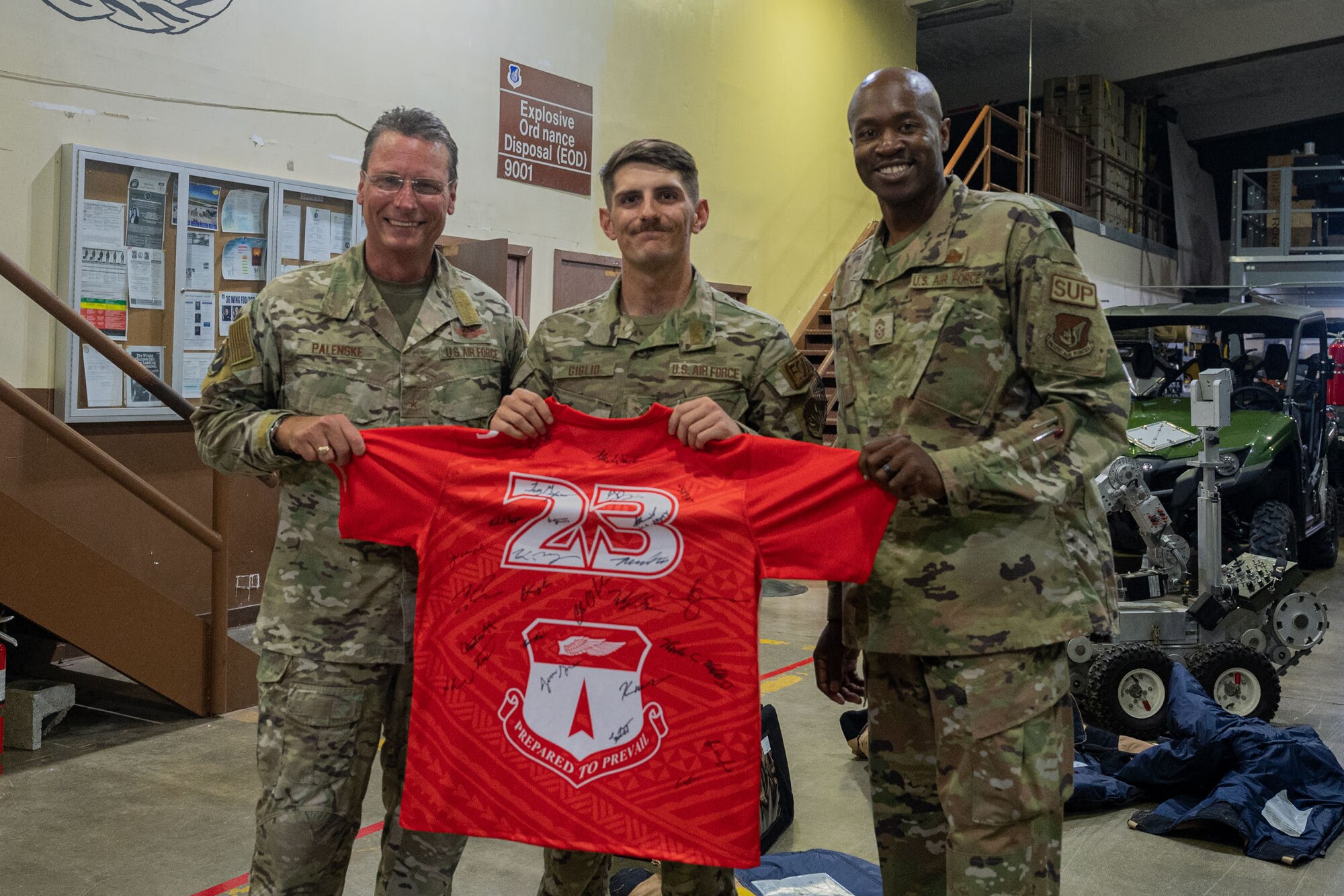 Photo of an Airman receiving the Linebacker of the Week Award