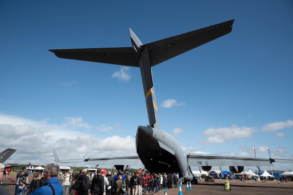 Crowds gather to view a U.S. C-17 Globemaster III at the 2023 Royal International Air Tattoo at RAF Fairford, England, July 15, 2023. RIAT participation demonstrates U.S. commitment to European allies and partners while highlighting U.S. capabilities to a diverse audience, emphasizing unity, innovation, and a shared commitment to excellence. (U.S. Air Force photo by 1st Lt. Symantha King) (U.S. Air Force photo by 1st Lt. Symantha King)