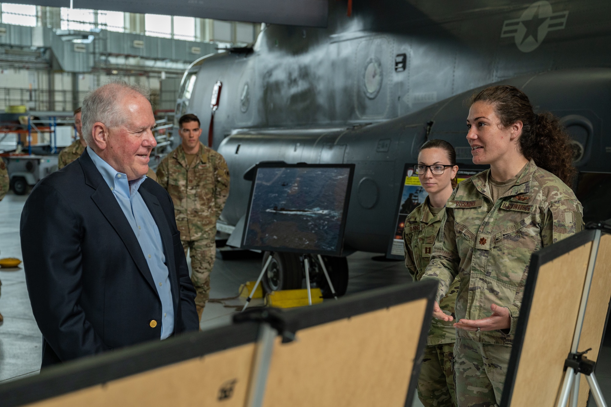 Secretary of the Air Force Frank Kendall is briefed about the unique missions of the 352nd Special Operations Wing at Royal Air Force Mildenhall, England, July 13, 2023.