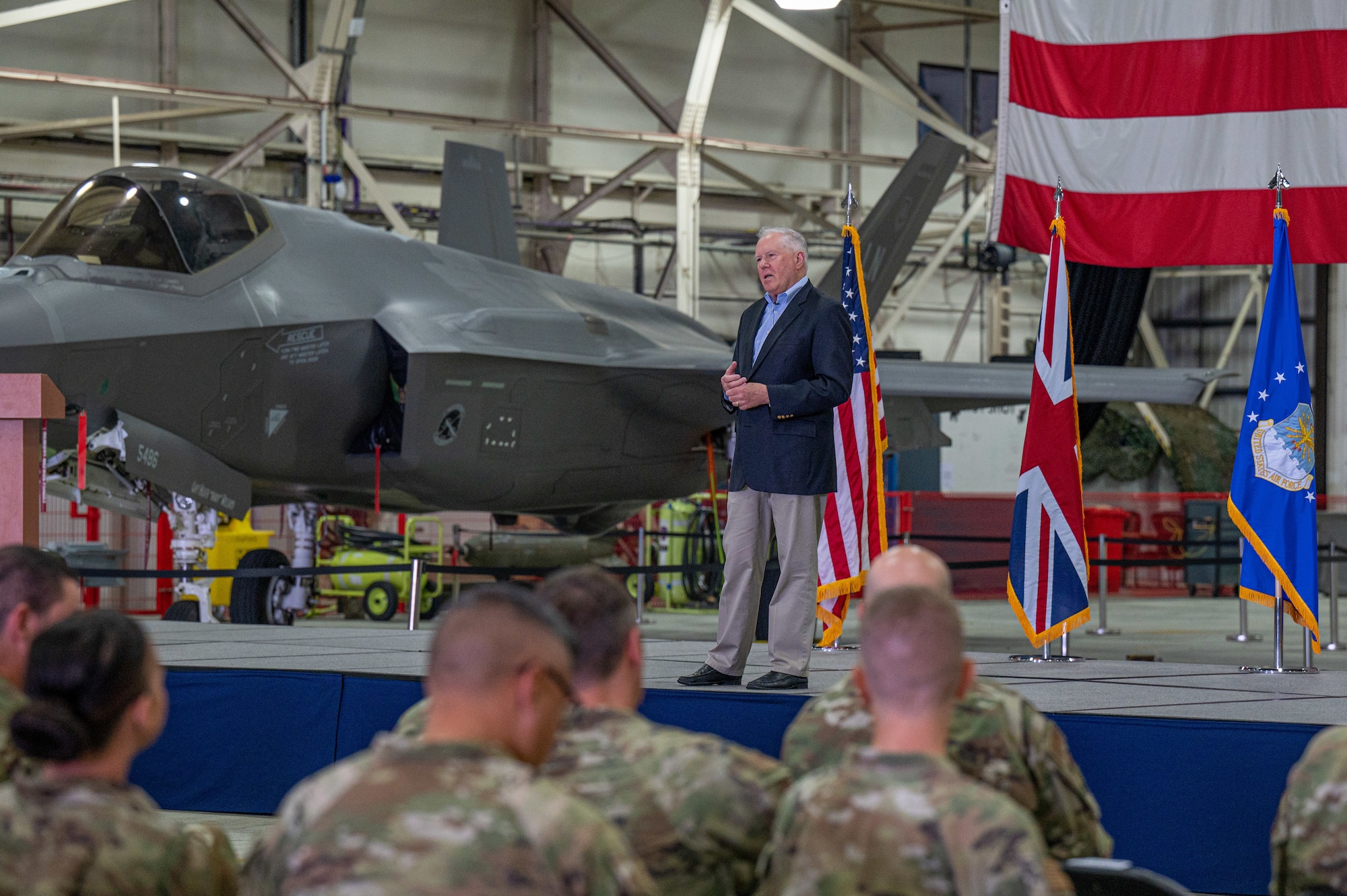 Secretary of the Air Force Frank Kendall addresses the 48th Fighter Wing during a base-wide all-call at RAF Lakenheath, England, July 13, 2023. During a base-wide all-call, Kendall emphasized the importance of the Liberty Wing’s mission as U.S. Air Forces in Europe’s only fourth and fifth generation fighter wing and the region’s premiere fighter wing. (U.S. Air Force photo by Airman 1st Class Seleena Muhammad-Ali)