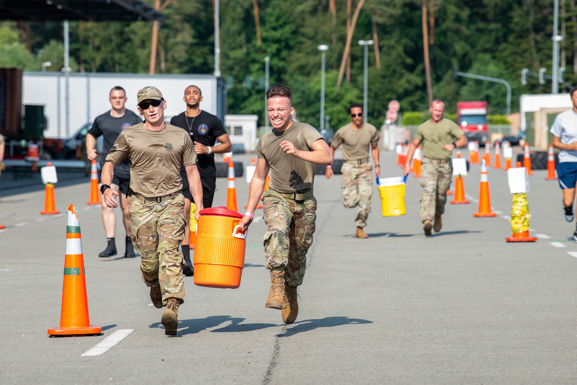 U.S. Air Force Airmen assigned to the 721st Mobility Support Squadron, located on Ramstein Air Base, Germany, complete the 436th Security Forces Squadron’s Ravens endurance course during the 521st Air Mobility Operations Wing’s Mobility Rodeo, at Ramstein AB, July 11, 2023.
