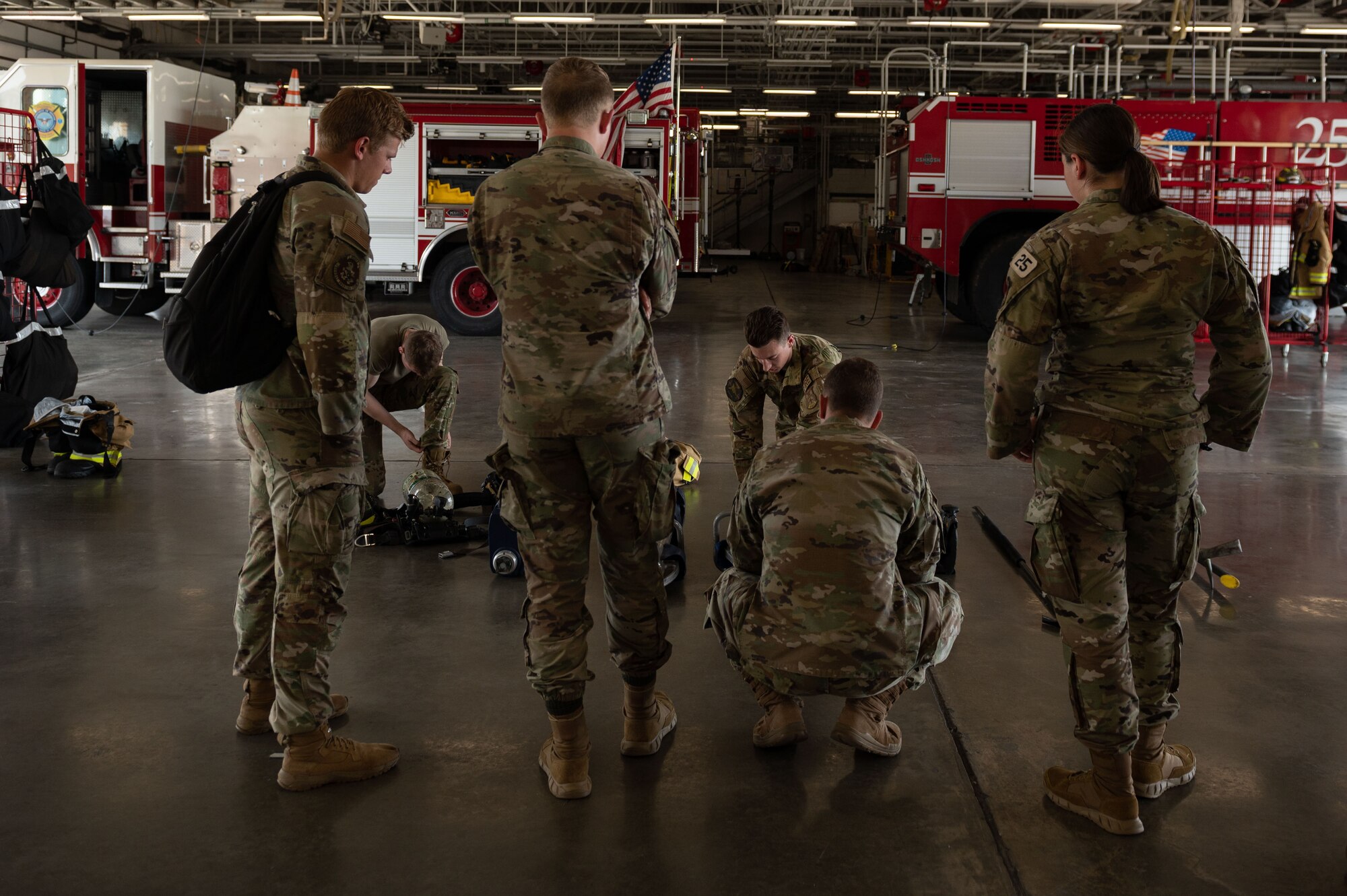 Airmen assigned to the 4th Civil Engineer Squadron demonstrate the different tools they use to U.S. Air Force Academy cadets during an Operation Air Force visit at Seymour Johnson Air Force Base, North Carolina, July 8, 2023. Military education plays a critical role in preparing cadets to become leaders in the cadet wing and later in the Air Force and Space Force. (U.S. Air Force photo by Airman 1st Class Rebecca Sirimarco-Lang)