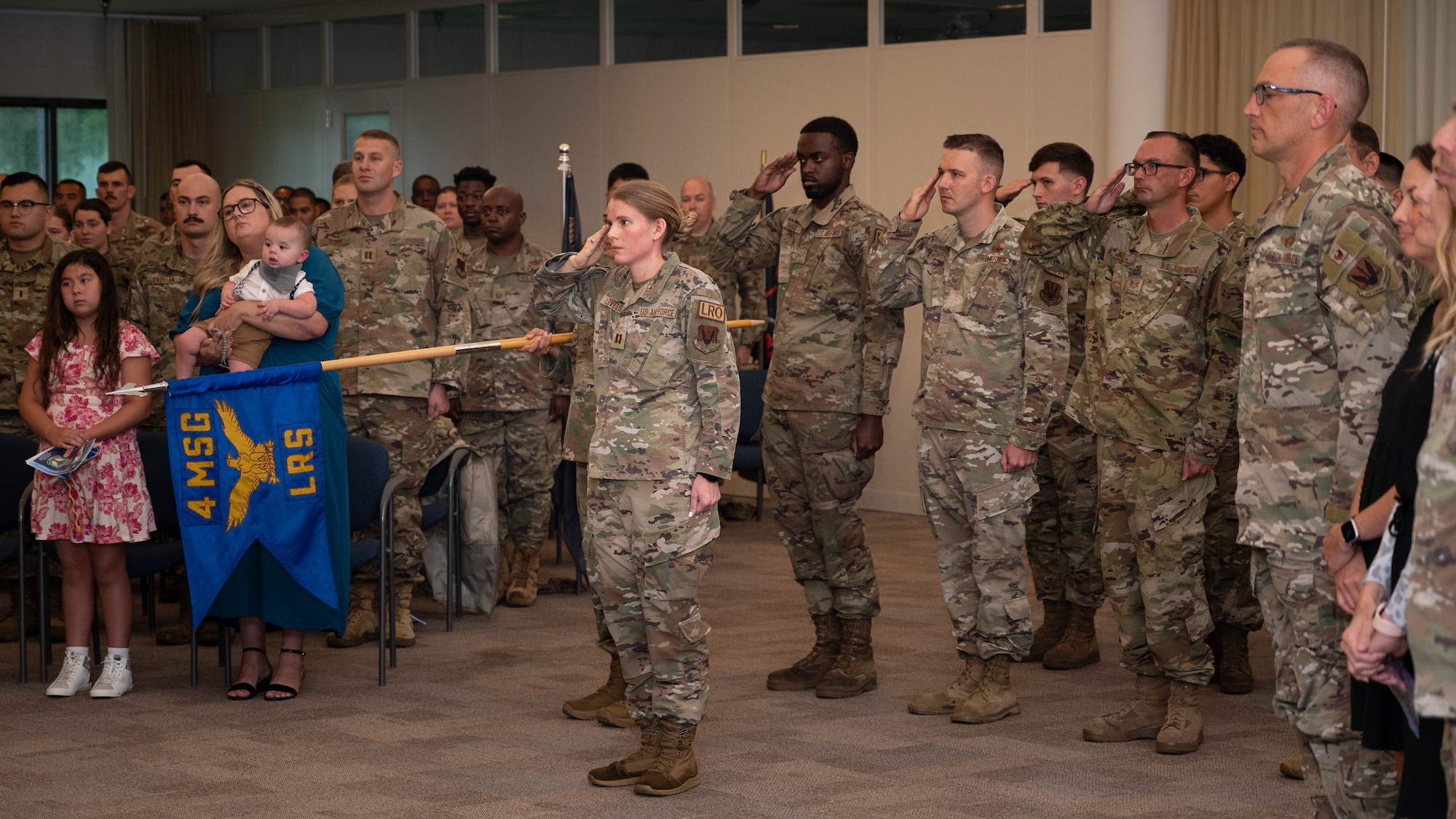 Airmen assigned to the 4th Logistics Readiness Squadron render a salute during a change of command ceremony at Seymour Johnson Air Force Base, July 14, 2023. The ceremony was conducted to commemorate the passing of command of the 4th Logistics Readiness Squadron from Lt. Col. Robert Fekete to Maj. Lovell C.K. Davis Jr. (U.S. Air Force photo by Staff Sgt. Koby I. Saunders)