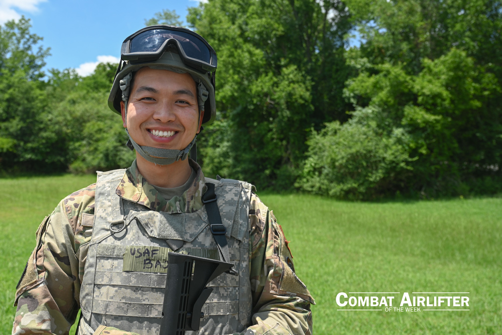 A man in uniform poses for a photo