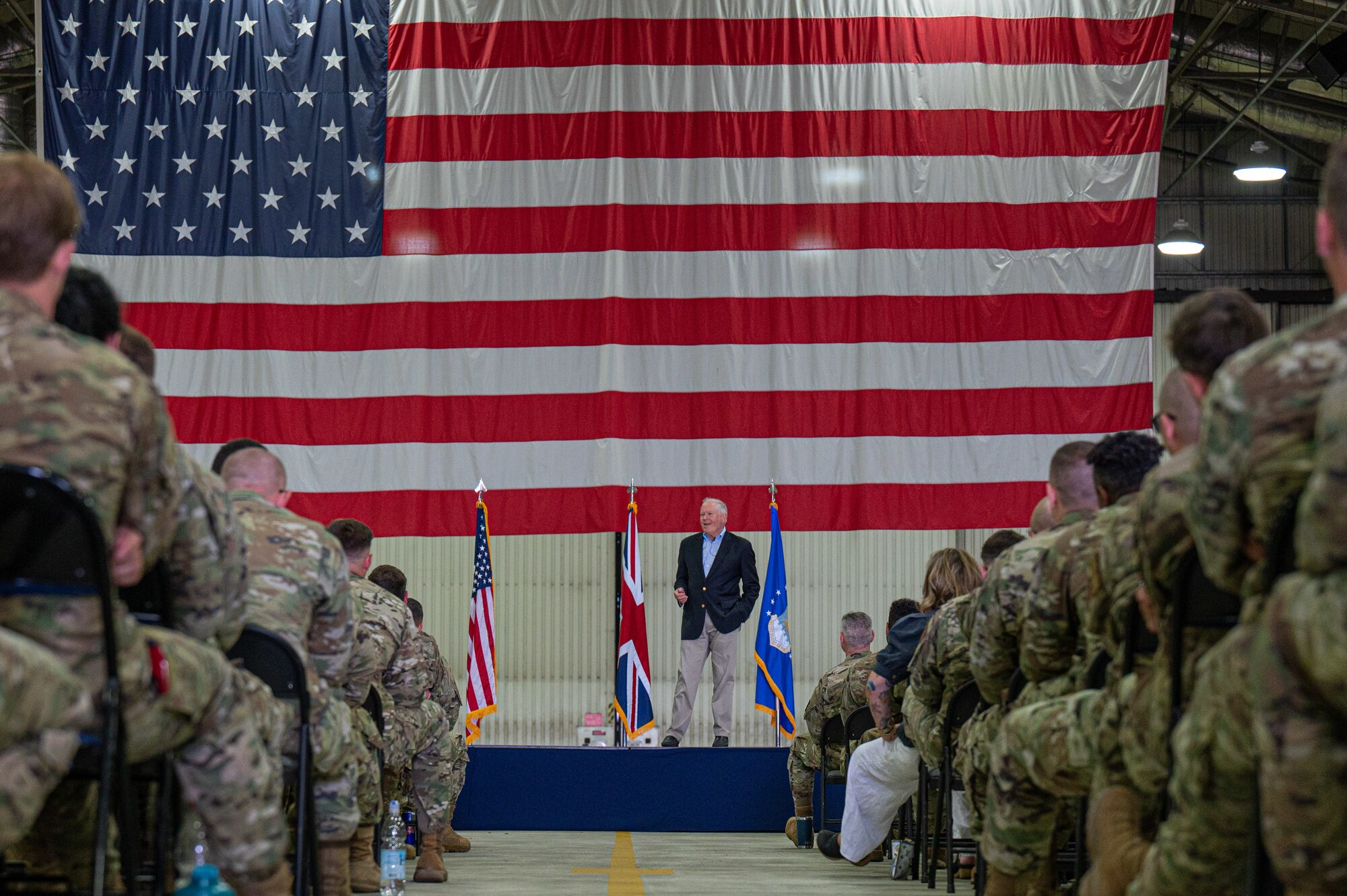 Secretary of the Air Force Frank Kendall addresses the 48th Fighter Wing during a base-wide all-call at RAF Lakenheath, England, July 13, 2023. During his trip, Kendall visited various units where he held discussions on vital matters, highlighted strategic goals, acknowledged the contributions of Airmen and shared his vision for the future during a base-wide all-call. (U.S. Air Force photo by Airman 1st Class Seleena Muhammad-Ali)