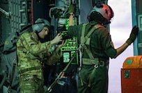 Staff Sgt. Taylor Crul, 1st Combat Camera aerial combat photographer, documents a search-and-rescue operation while taking part in Mobility Guardian 2023 off the coast of Rota, Commonwealth of the Northern Mariana Islands, July 10, 2023.