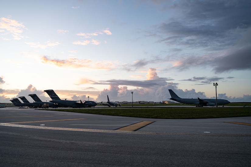 USAF C-17s and Allied aircraft are parked on the Andersen Air Force Base flight line in Guam on July 11, 2023.