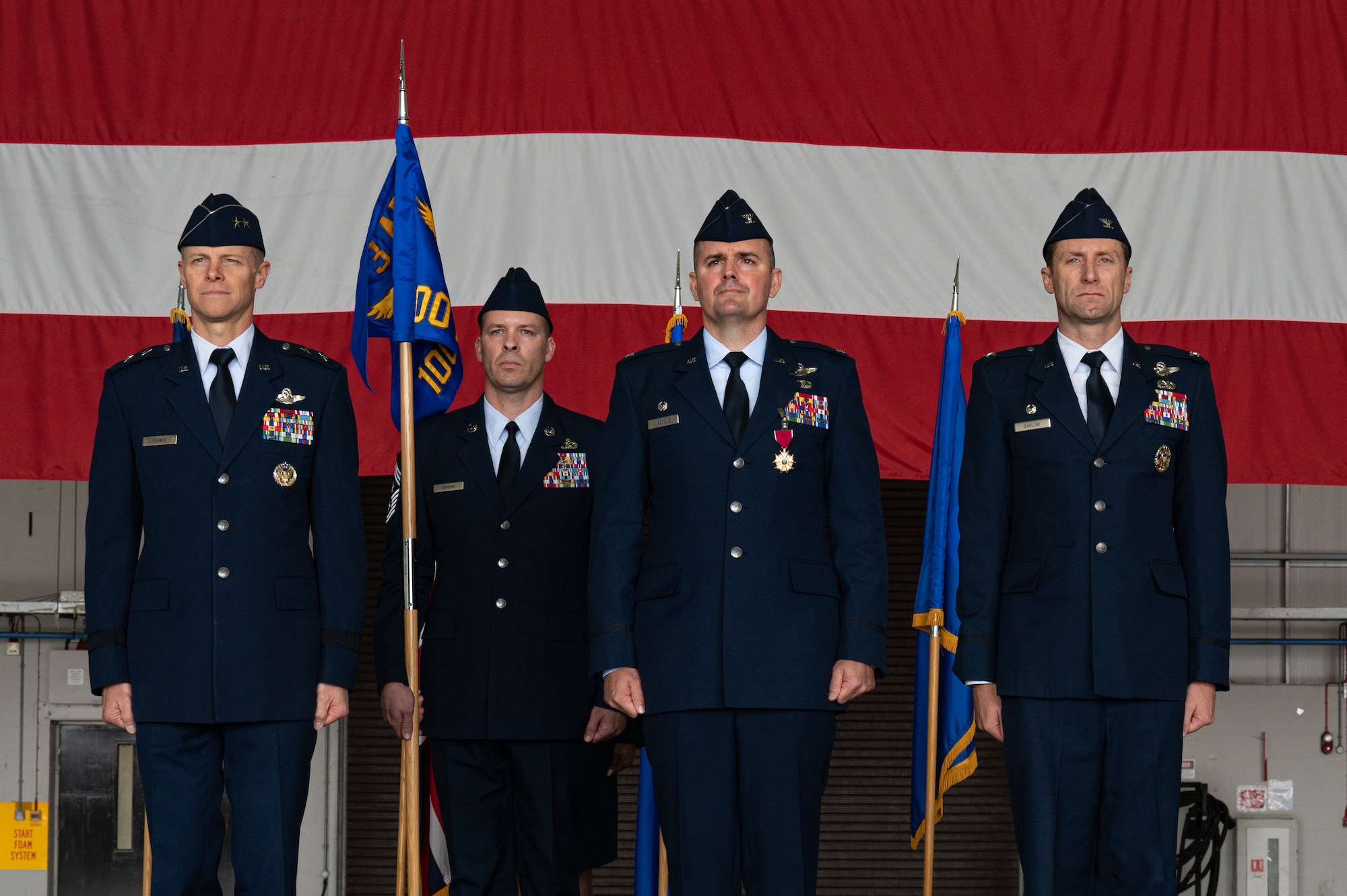 U.S. Air Force Col. Ryan Garlow takes command of the 100th Air Refueling Wing at a change of command ceremony at RAF Mildenhall, England, July 17, 2023.