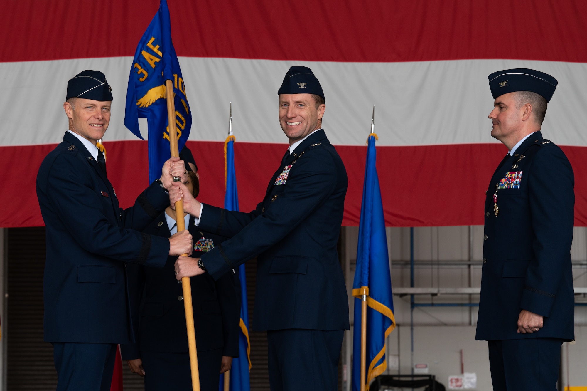 U.S. Air Force Col. Ryan Garlow takes command of the 100th Air Refueling Wing at a change of command ceremony at RAF Mildenhall, England, July 17, 2023.