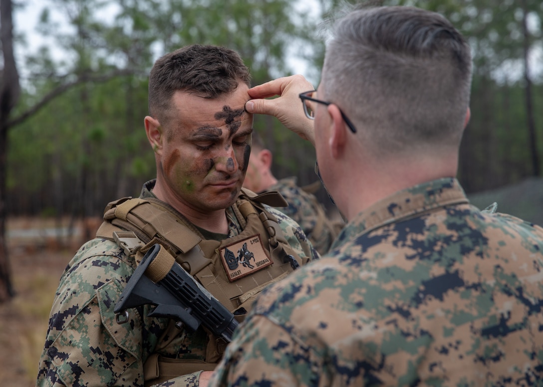 U.S. Marine Corps 1st Sgt. Nathan Hanley, First Sergeant with 1st Battalion, 2nd Marine Regiment, 2d Marine Division receives ashes during an Ash Wednesday field service on Camp Lejeune, North Carolina, Feb. 26, 2020. Ash Wednesday marks the beginning of Lent, a six-week observance of repentance and prayer. (U.S. Marine Corps photo by Cpl. Ashley McLaughlin)