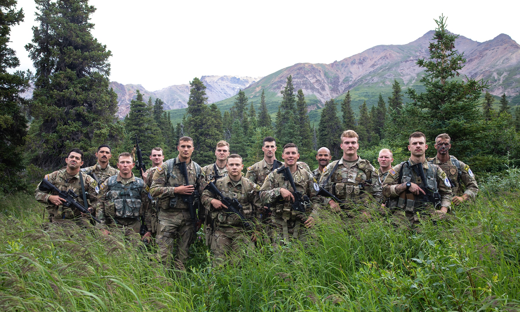 The 2023 Army National Guard Best Warrior Competition competitors pose for a group photo at Black Rapids Training Area, Alaska on July 10, 2023.