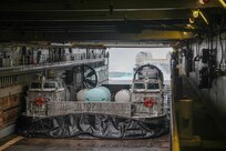 Ship to Shore Connector (SSC), Landing Craft, Air Cushions (LCAC) 105-107 received a lift of opportunity (LOO) aboard USS Gunston Hall (LSD 44), on July 14.