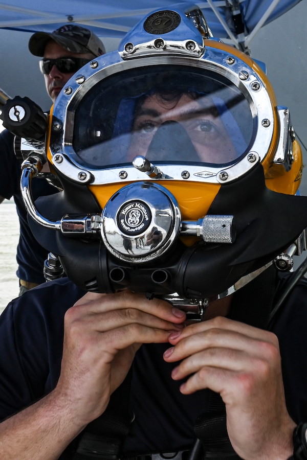 CARTAGENA, COLOMBIA (July 14, 2023) - Navy Diver 1st Class Michael Clutch, assigned to Mobile Diving and Salvage Unit 2 (MDSU-2) performs pre-dive checks aboard ARC Golfo de Morrosquillo (LD 242) during UNITAS LXIV, July 14, 2023.