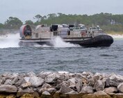 Ship to Shore Connector (SSC), Landing Craft, Air Cushions (LCAC) 105-107 received a lift of opportunity (LOO) aboard USS Gunston Hall (LSD 44), on July 14.