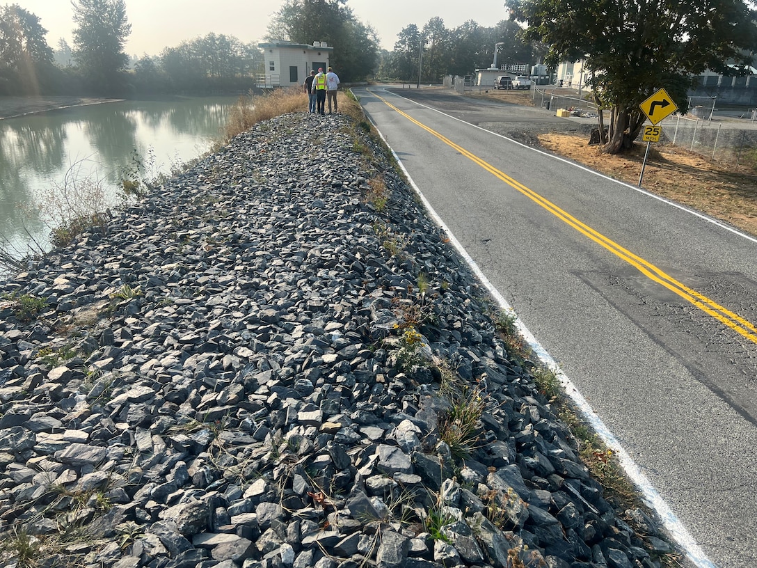 Photo of a levee that is being repaired.