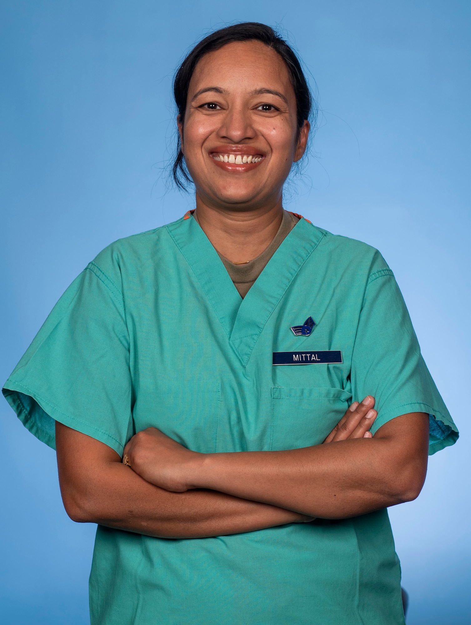 U.S. Air Force Senior Airman Shweta Mittal, 92nd Operational Medical Readiness Squadron dental assistant, poses for a portrait photo at Fairchild Air Force Base, Washington, July 14, 2023. Mittal joined the Air Force with a Ph.D. in biotechnology degree from Banasthali University and hopes to become a biomedical officer and work for the Air Force Research Laboratories. (U.S. Air Force photo by Airman 1st Class Morgan Dailey)