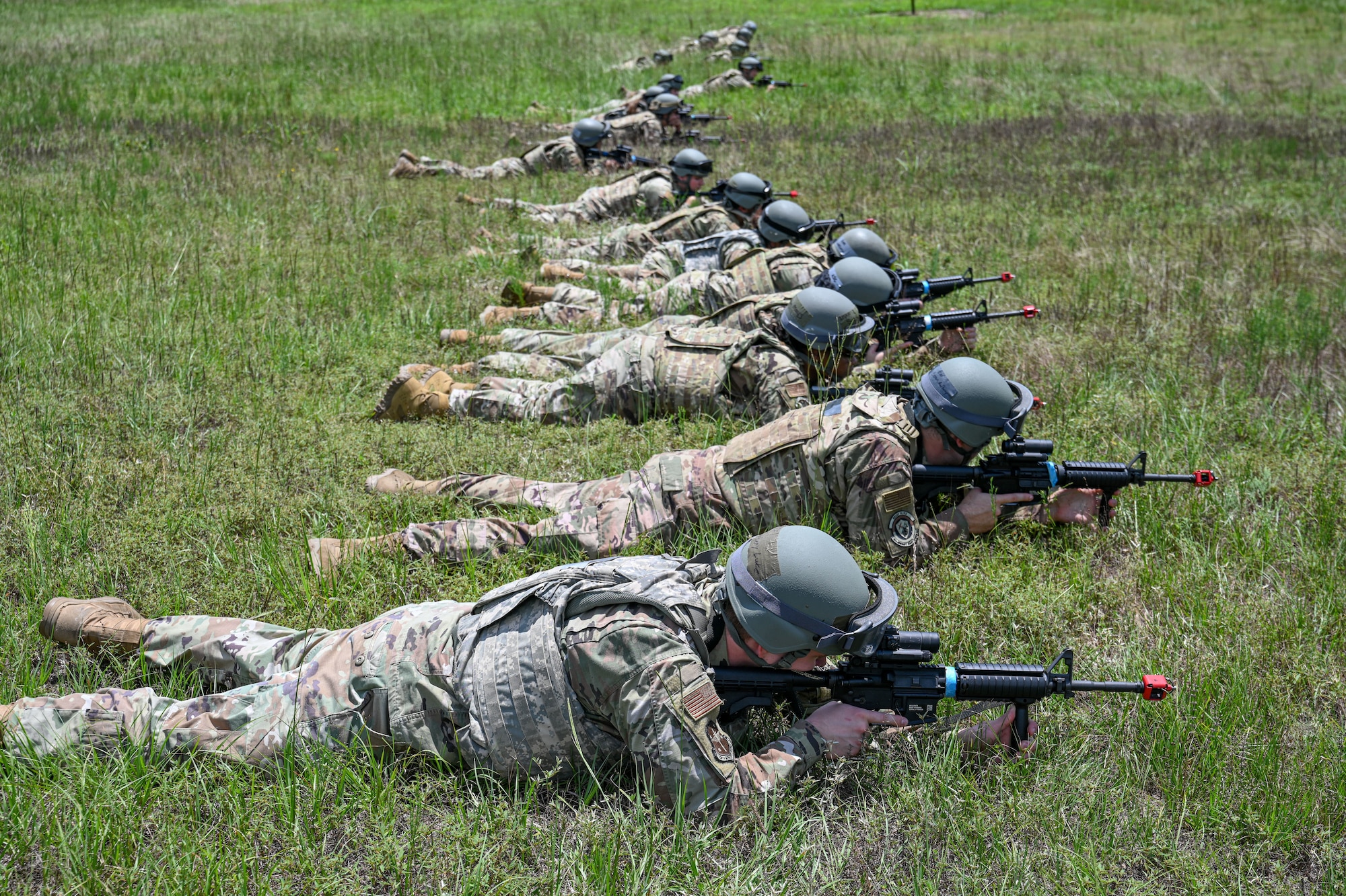 man in uniform teaches basic tactical movement
