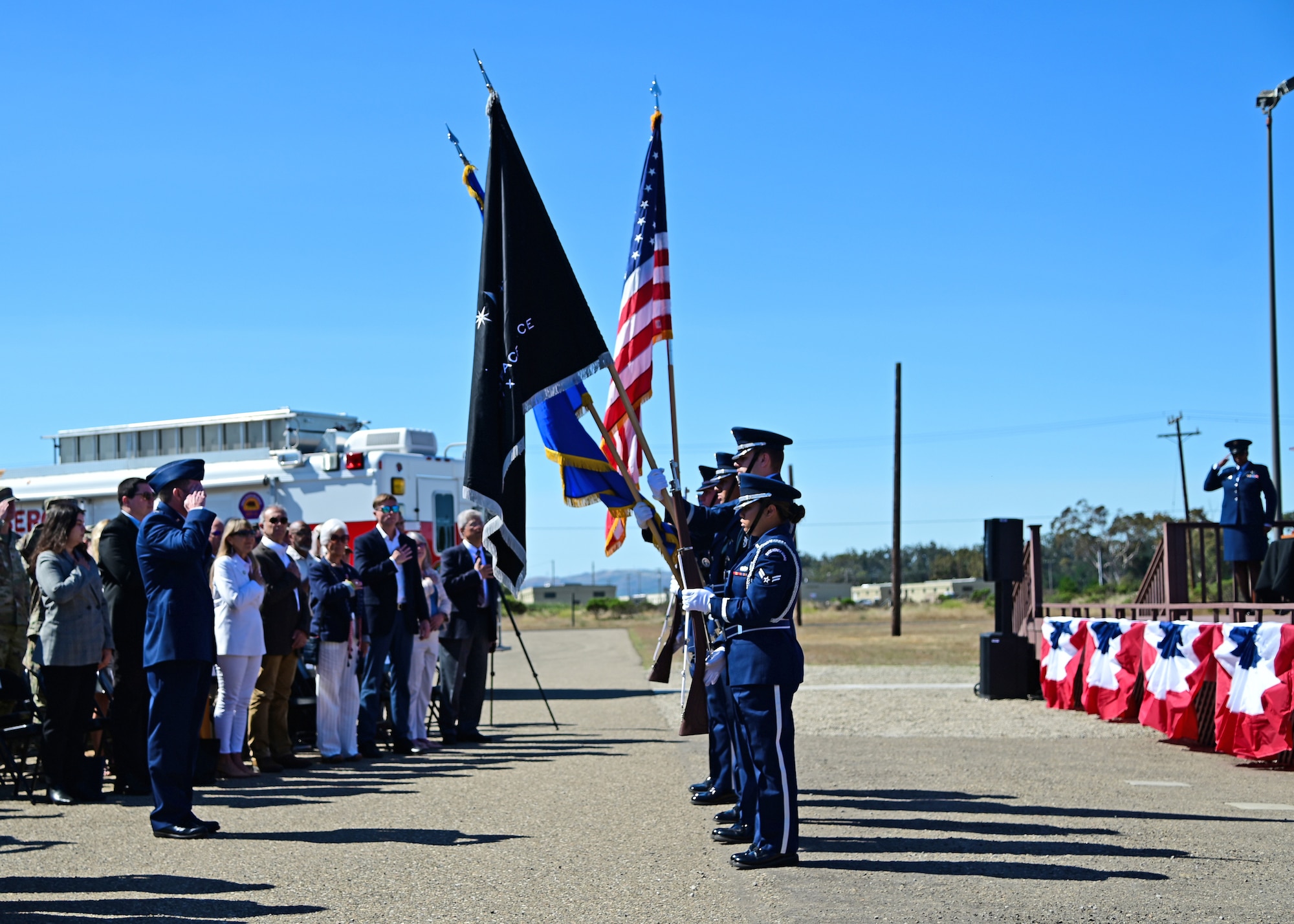 The Vandenberg Space Force Base Honor Guard presents the colors during the Space Launch Delta 30 change of command ceremony on Vandenberg Space Force Base, Calif., July 13, 2023. U.S. Space Force Col. Robert Long relinquished command to U.S. Space Force Col. Mark Shoemaker. U.S. Space Force Lt. Gen. Michael Guetlein, Space Systems Command commander, presided over the ceremony. (U.S. Space Force photo by Airman 1st Class Ryan Quijas)